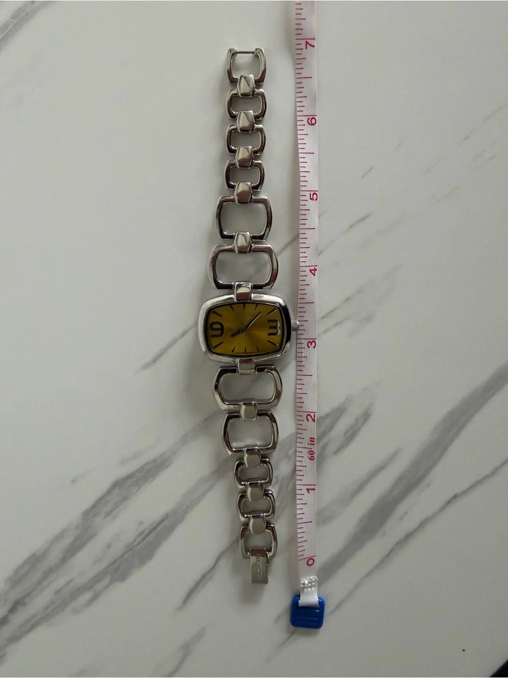 Vintage Invicta Silver Watch with Yellow Dial